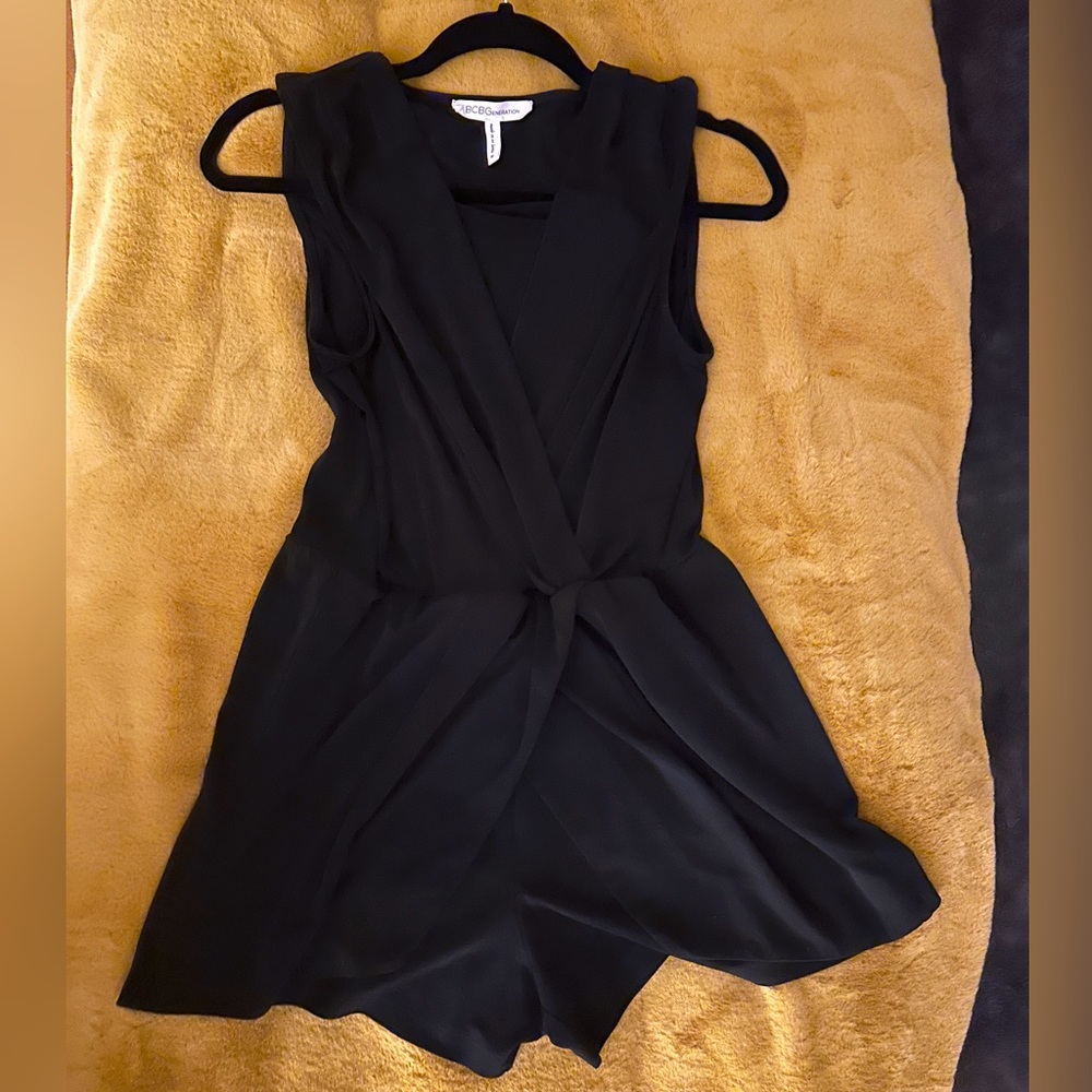 Black v-neck (with snap) romper.  Dress up or down for summer.